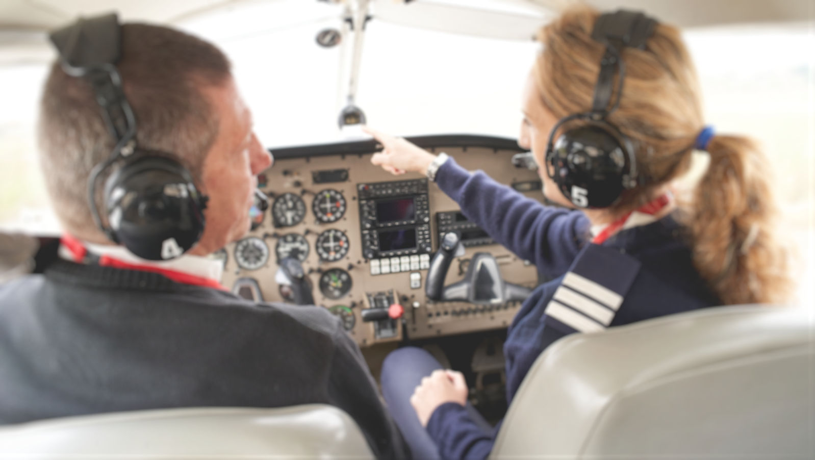 Fligjt Schools Pilot training cockpit with instructional panels in flight school